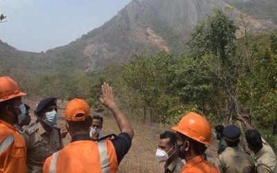 Efforts continue to rescue youth trapped in cave on steep hill