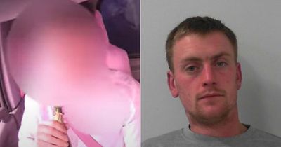 Van driver filmed swigging champagne and rolling cigarette behind the wheel is jailed