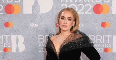 Adele sparks engagement rumours with huge sparkling ring on BRIT Awards red carpet