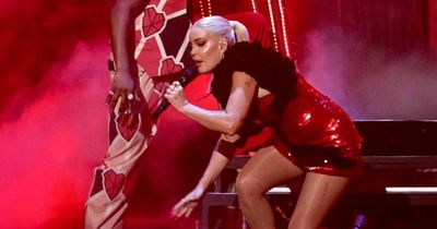 Anne-Marie falls down the stairs during Brit Awards performance