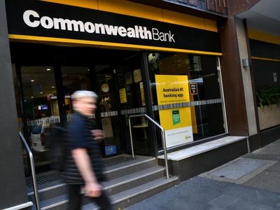 CBA lifts first half profit, share buyback