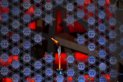 AP PHOTOS: Athletes soar high in Day 4 at Beijing Olympics