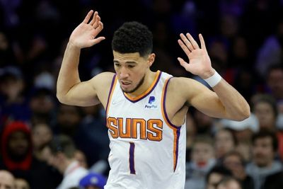 Booker powers first-place Suns over Sixers, Celtics clobber Nets
