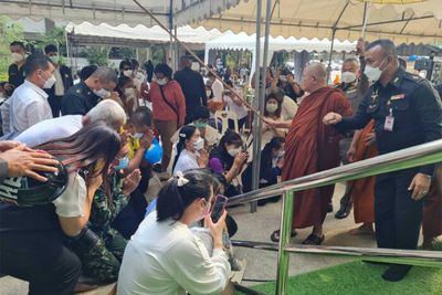 Crowds throng to merit-making ceremony for victims of Korat mass shooting
