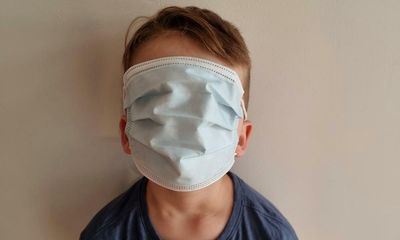 ‘Protects the nose, mouth, eyes’: Tasmanian government sends large adult masks to children