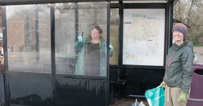 Dumfries and Galloway Greens clean bus shelters to highlight Haud the Bus campaign