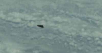 UFO enthusiast spots strange 'alien object' floating above Earth in NASA photo