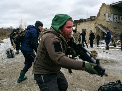 ‘We’ll fight for Kyiv’: Ukrainian civilians train to repel Russia