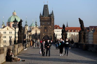 Czechs ditch COVID-19 pass rules, ease limits on crowds