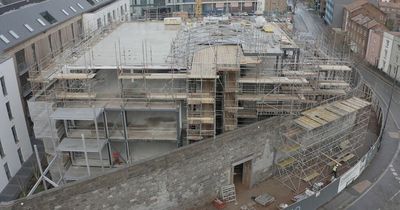 Bristol harbourside office complex takes shape as roof raised on former J S Fry warehouse