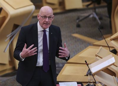 Holyrood passes Covid compensation Bill and backs review of isolation grants