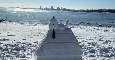 ‘We made a Snowpy!’: Hyde Park pair sculpt Snoopy out of Promontory Point snow