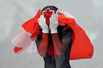 AP PHOTOS: Stars stand out on day 5 of the Winter Olympics