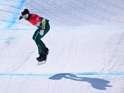 Hughes shattered after Games 'cross blow