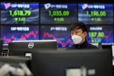 Asian shares mostly higher after Wall Street tech rally