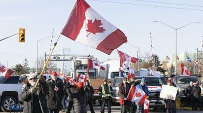 Trudeau Slams Canada Trucker Protests, Police Threaten Arrests