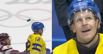 Ice hockey player channels inner Cristiano Ronaldo as he heads puck at Winter Olympics