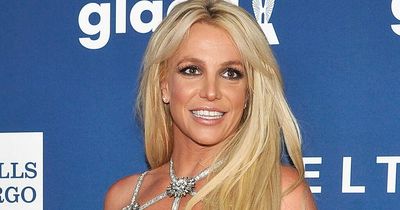Britney Spears performs sultry dance routine in cut-out swimsuit as she teases new song