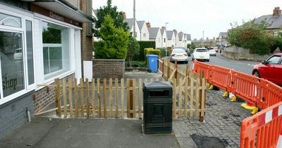 Couple who built 4ft fence to block chip shop queues selling home for huge loss