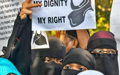Hijab row: RSS’ Muslim Wing backs burqa-clad girl, says ‘purdah’ part of Indian culture
