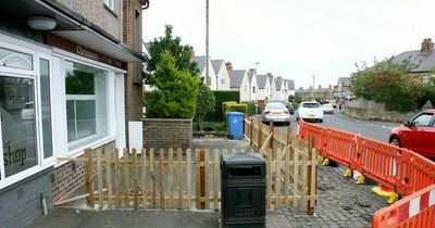 Couple who built 4ft fence to block fish and chip queues forced to sell home