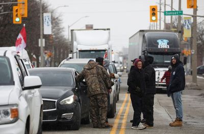 Windsor mayor says authorities prepared to physically remove trucker protesters if needed