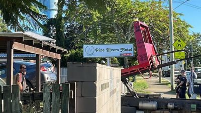 Trio being questioned as Queensland police investigate suspicious death at Pine Rivers Motel