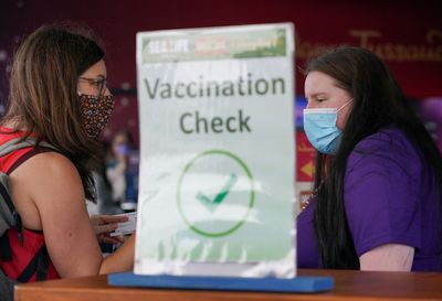 Australians told to get COVID boosters to be considered fully vaccinated
