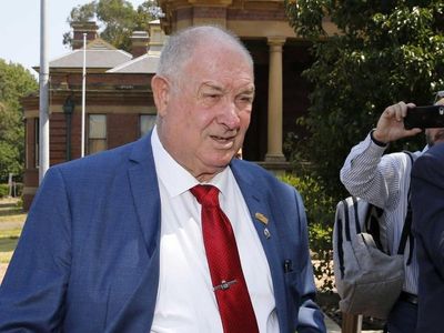 Widow slams ex-NSW police minister's dad