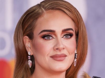 Adele hits back at critics who twisted her Brit Awards speech during GAY appearance