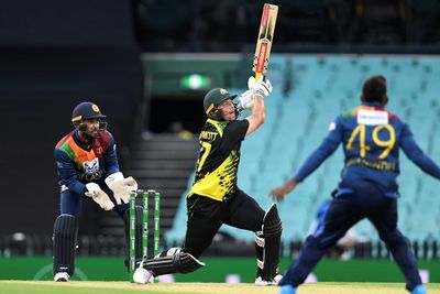 McDermott hits 53 as Sri Lanka restrict Australia to 149 for nine