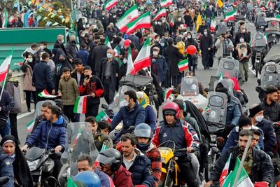 Iranians get behind wheel to mark Islamic revolution