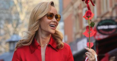 Amanda Holden flashes lace bra as she leaves work in head to toe red for Valentine's Day