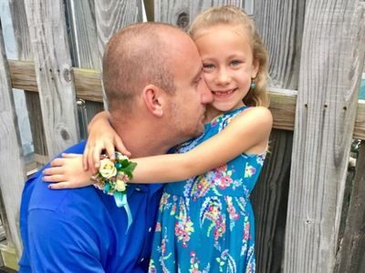 Her dad died. So her favourite NFL star took her to the father-daughter dance.