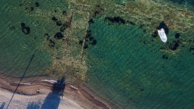 VIDEO: Man Finds Remains Of Long-Lost Ancient Greek Harbor While Swimming In Bay