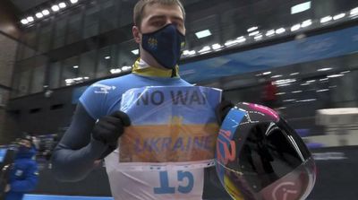 Olympian Flashes ‘No War in Ukraine’ Sign after Competing
