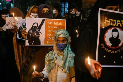 Hijab ban 'forces choice of religion or education'