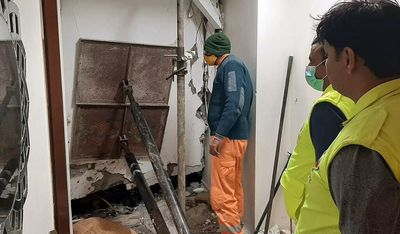 Debris tumbles down amid rescue efforts in partially collapsed Gurugram building; residents panic