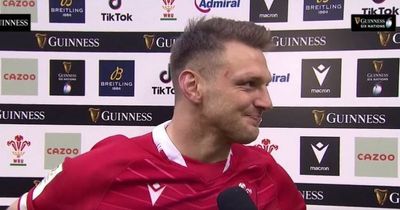 Dan Biggar receives moving ovation for leading Wales to victory with one leg after wild scenes on final whistle