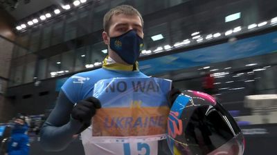 IOC to take no action against sign-waving skeleton racer as Ukrainian officials call for peace