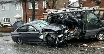 Carnage as BMW ploughs into back of van on quiet residential street