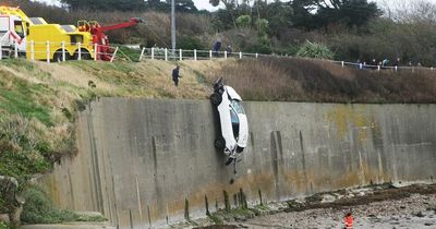 Smashed car winched off Dublin beach after handbrake mishap
