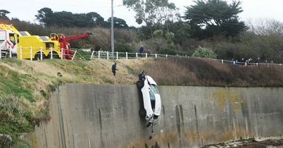 Car smashed through metal fence and rolled down to Dublin beach after handbrake left off