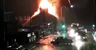 Hero Edinburgh firefighters battle blaze as building bursts into flames