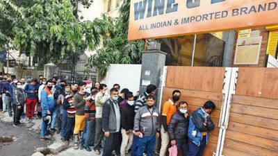 Delhi: Cheers to discounted liquor, long queues outside stores