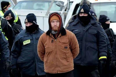 Canada police clear key border bridge but protests still crippling Ottawa