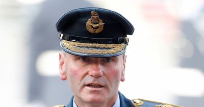 RAF deputy chief suspended for 'flashing naked bum at neighbours while in garden'