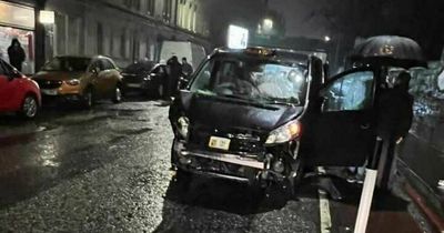 Two rushed to Edinburgh hospital as three-car smash shuts city centre road