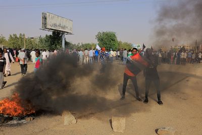 One protester killed as thousands rally across Sudan against coup - medics