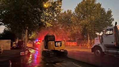 Gas leak forces evacuation of homes and closure of major Adelaide road after main ruptured by excavator